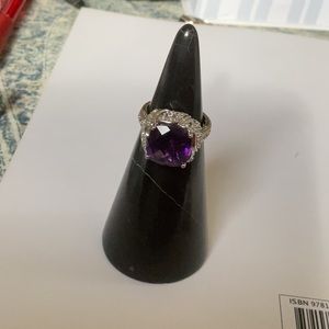 Stunning 6.25 carat natural amethyst ring with natural white topaz stones.